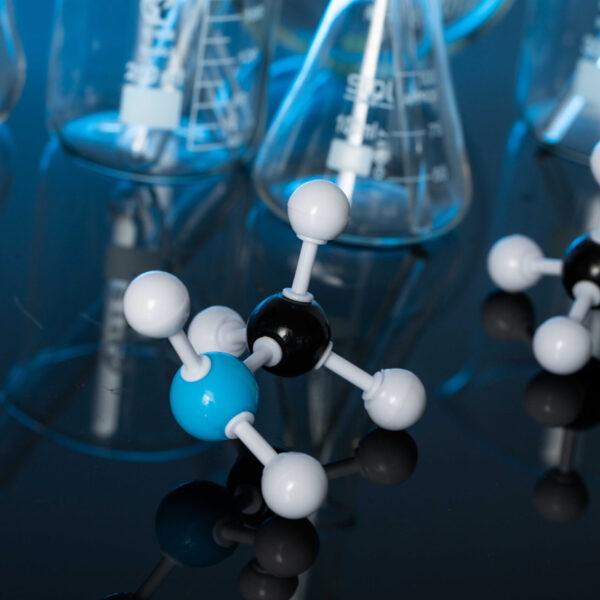 A closeup shot of molecular structures on a lab table